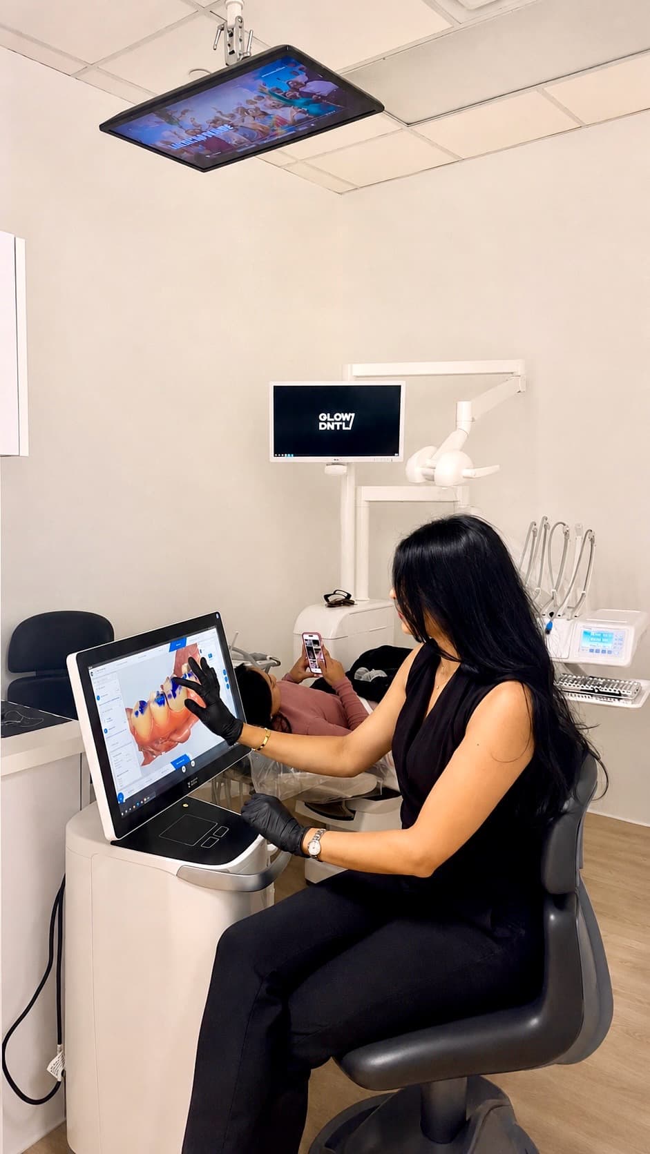 Single-visit crown being designed chairside on the digital scanner at GLOW DNTL